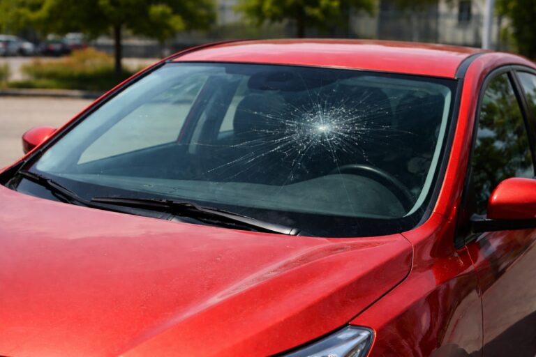 Red Sedan Windshield Cracked resized